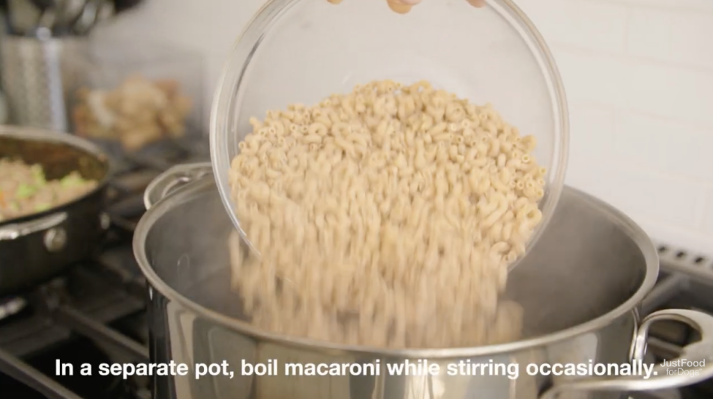 macaroni being poured into boiling water